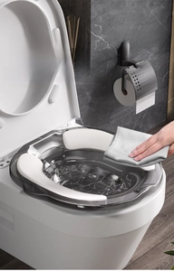 Macro view of integrated toilet bidet basin with smooth easy-to-clean surface