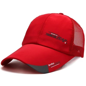 Detail of red mesh sports baseball cap with extended brim and side text printing