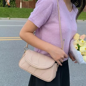 Quilted beige leather crossbody phone bag with long strap and ring buckle design