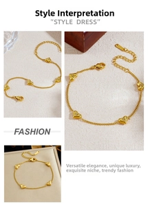 Detail view of gold-plated stainless steel heart bracelet with cubic zirconia accents