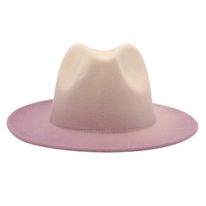 Detail of gradient fedora hat transitioning from beige top to soft purple wide brim