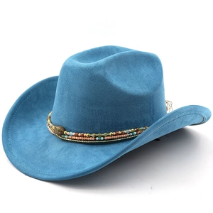 Close-up of peacock blue cowboy hat featuring colorful beadwork and a brown gemstone