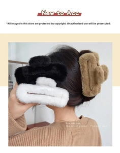 Three plush hair claws in black, white, and tan colors for autumn and winter styles