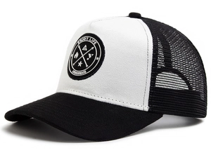 Detail of black and white mesh trucker hat with Enjoy Life Originals round badge