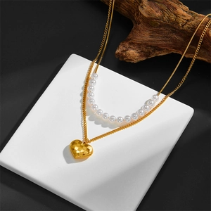 Double-layer stainless steel necklace with gold heart pendant and white pearls