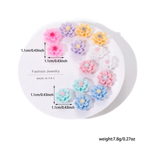 Detailed view of 1.1cm resin flower earrings in assorted pastel macaron colors