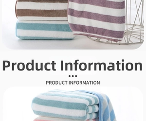 Detailed texture of thick striped coral fleece bath towel with high water absorption