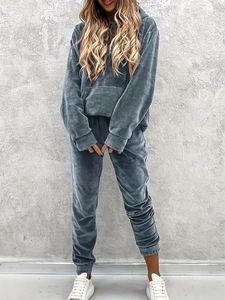 Front full view of women's gray-blue velvet lounge set with hoodie and joggers