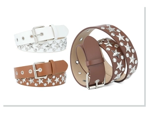 Flat lay of three punk style star studded belts in white, brown and dark brown colors