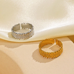 Adjustable geometric stainless steel rings in gold and silver with beaded texture
