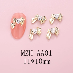 Ciondoli per unghie a fiocco dorati con strass a cuore, 11x10mm, mod. MZH-AA01