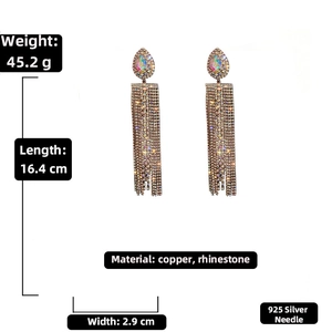 Detail showing luxurious drop earrings with long rhinestone tassels and 925 silver pins