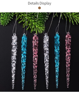 Macro view of blue pink and clear acrylic spiral icicle ornaments for Christmas trees