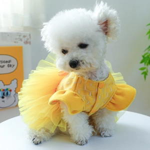 Detail of yellow pet dress featuring fluffy tulle layers and premium cotton stitching