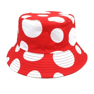 Red and white mushroom pattern reversible bucket hat with cotton twill stitching