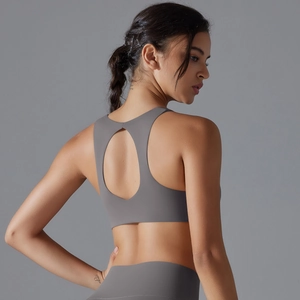 Dark grey backless sports bra and yoga leggings set with hollow-out back design