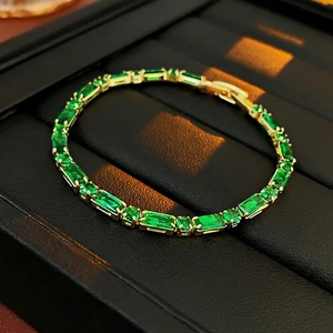 Elegant 18K gold-plated tennis bracelet featuring emerald-cut zircon stones in a gift box
