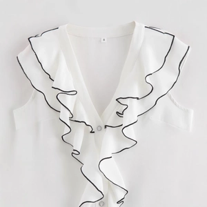 Sleeveless white chiffon top with V-neck and layered ruffle trim with black edges
