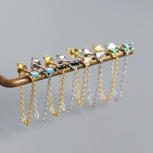 Detail of s925 silver fringe tassel earrings with colorful cubic zirconia and chains