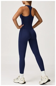 Detail view of navy blue yoga set with racerback top and side pocket leggings