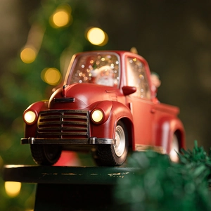 Camion rouge rétro boîte à musique de Noël avec Père Noël et phares lumineux
