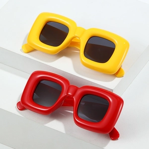 Y2K fashion square thick frame sunglasses in bright yellow and red with dark lenses
