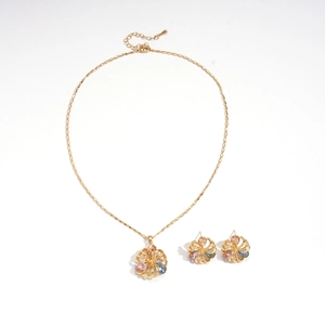 Elegant 18K gold plated hollow floral jewelry set with colorful zircon stones on white