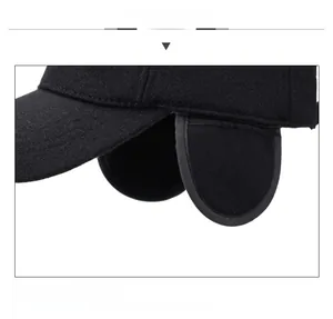 Detail shot of winter baseball cap showing ear flaps and SPORT metal logo