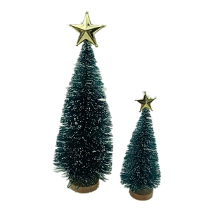 Miniature snow-dusted Christmas trees with golden stars and natural wooden bases
