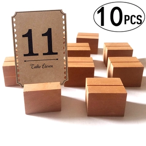 Close-up of 10-piece wooden card holders with smooth texture and precision slot detail