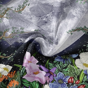 Detailed view of bohemian moon phase tapestry fabric featuring floral and celestial prints
