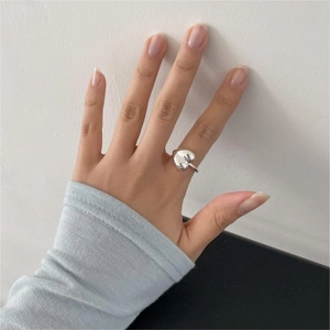 Polished 925 sterling silver heart ring showing detailed 3D shape and glossy metallic finish