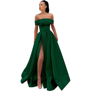 Detail of dark green satin off-shoulder evening gown with high slit and elegant waist