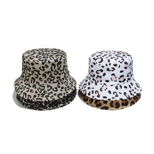 Set of four stylish leopard print bucket hats in diverse colors for women fashion