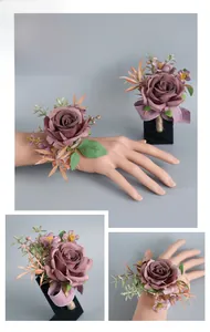 Detail of a vintage caramel pink rose wrist corsage with silk ribbons for wedding