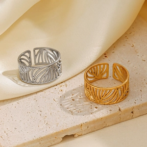 Gold and silver stainless steel leaf rings with adjustable open band design