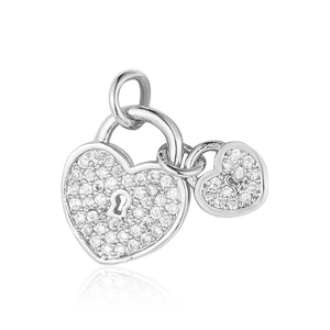 Macro shot of silver heart lock and key pendant with micro-paved cubic zirconia stones