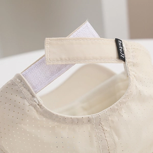 Detail of breathable mesh kids baseball cap featuring an adjustable velcro strap closure