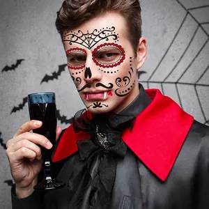 Halloween face tattoo stickers with spider web and vampire bat designs for parties