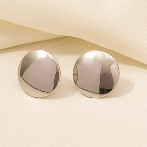 Detail of minimalist 304 stainless steel round stud earrings with polished silver finish