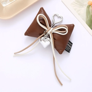 Brown and beige PU leather bow keychain with heart pendant for handbag decoration