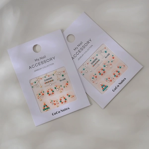 Christmas 3D nail art stickers with K9 rhinestones featuring trees and wreaths