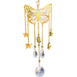 Golden butterfly crystal suncatcher with star accents and faceted prism ball ornament