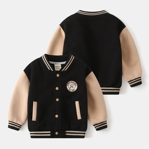 Close-up of boys' baseball jacket details showing rib-knit stripes and embroidery