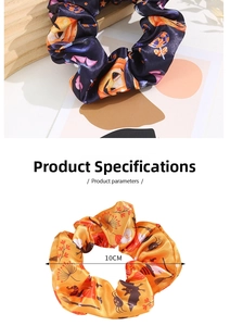 Detail of 10cm Halloween satin scrunchies with pumpkin and bat patterns