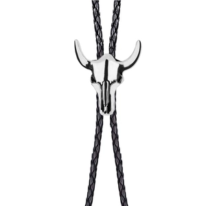Silver bull skull bolo tie with black braided leather cord on a clean white background