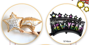 Détail de ballons Happy New Year en aluminium or et noir, dimensions 70x49cm