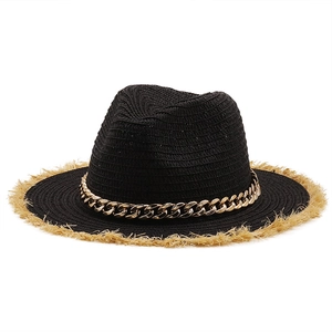 Women's black raffia sun hat with elegant gold chain and natural fringe trim