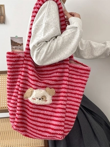 Cute pink striped plush tote bag with cartoon dog patch shown on shoulder