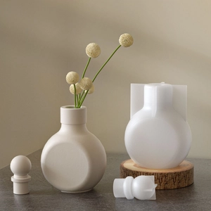 Macro detail of translucent silicone mold and minimalist beige resin flower vase